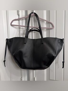 Spacious Black Leather Tote Bag with Dual Handles